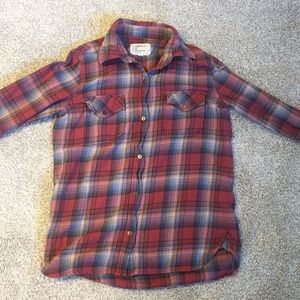 A casual red, white and blue striped flannel
